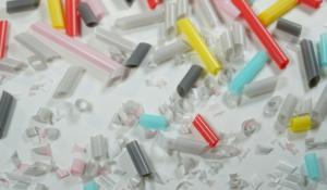 A close up shot of different colored straws that have been cut into smaller and smaller pieces.