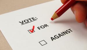 Image: a ballot voting yes. Topic: Shareholders Tell Walmart to Address its Polluting Refrigerants