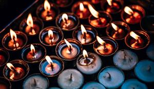 Image: lit and unlit nontoxic candles beeswax candles