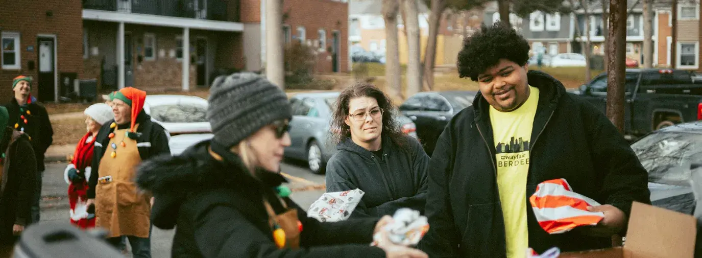 Gifts being delivered in the back of a truck to underserved communities. Photo by Samuel Peter.